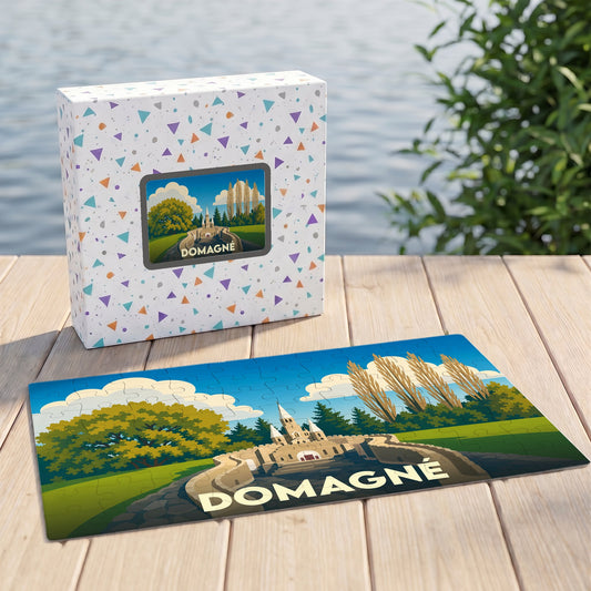Puzzle souvenir de la ville de Domagné avec une illustration stylisée et colorée.