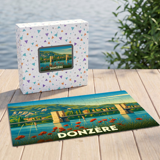 Puzzle souvenir de la ville de Donzère avec une illustration stylisée de son célèbre pont suspendu.