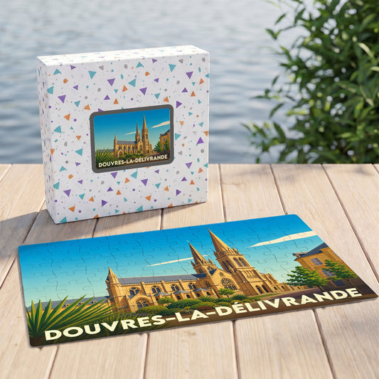 Puzzle souvenir de la ville de Douvres-la-Délivrande avec une illustration stylisée de sa basilique.