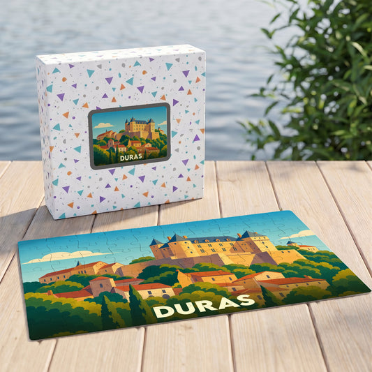 Puzzle souvenir de la ville de Duras illustré d'un château médiéval coloré.