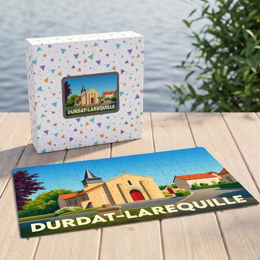 Puzzle souvenir de la ville de Durdat-Larequille avec une illustration stylisée de son église.