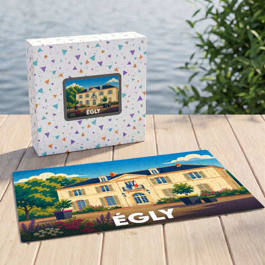 Puzzle souvenir de la ville d'Égly avec une illustration stylisée de sa mairie.