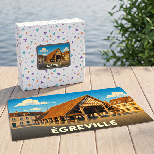 Puzzle souvenir de la ville d'Égreville présentant une illustration stylisée de ses halles historiques.
