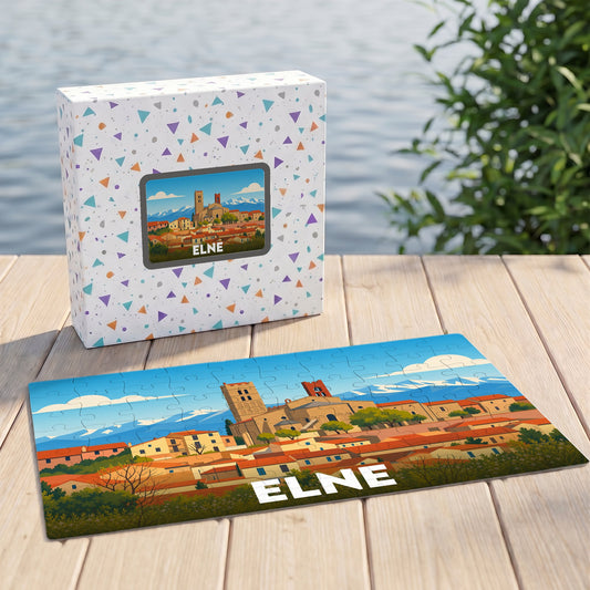 Puzzle souvenir de la ville d'Elne illustrant son paysage urbain et sa cathédrale dans un style coloré.