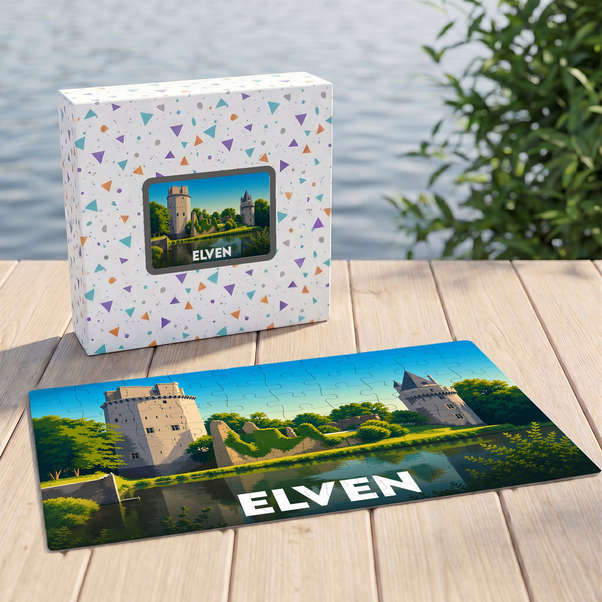 Puzzle souvenir de la ville d'Elven représentant ses tours médiévales au bord de l'eau.