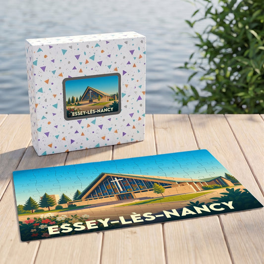 Puzzle souvenir de la ville d'Essey-lès-Nancy avec une illustration stylisée de son église moderne.