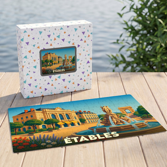 Puzzle souvenir de la ville d'Étables avec une illustration stylisée d'une place animée.