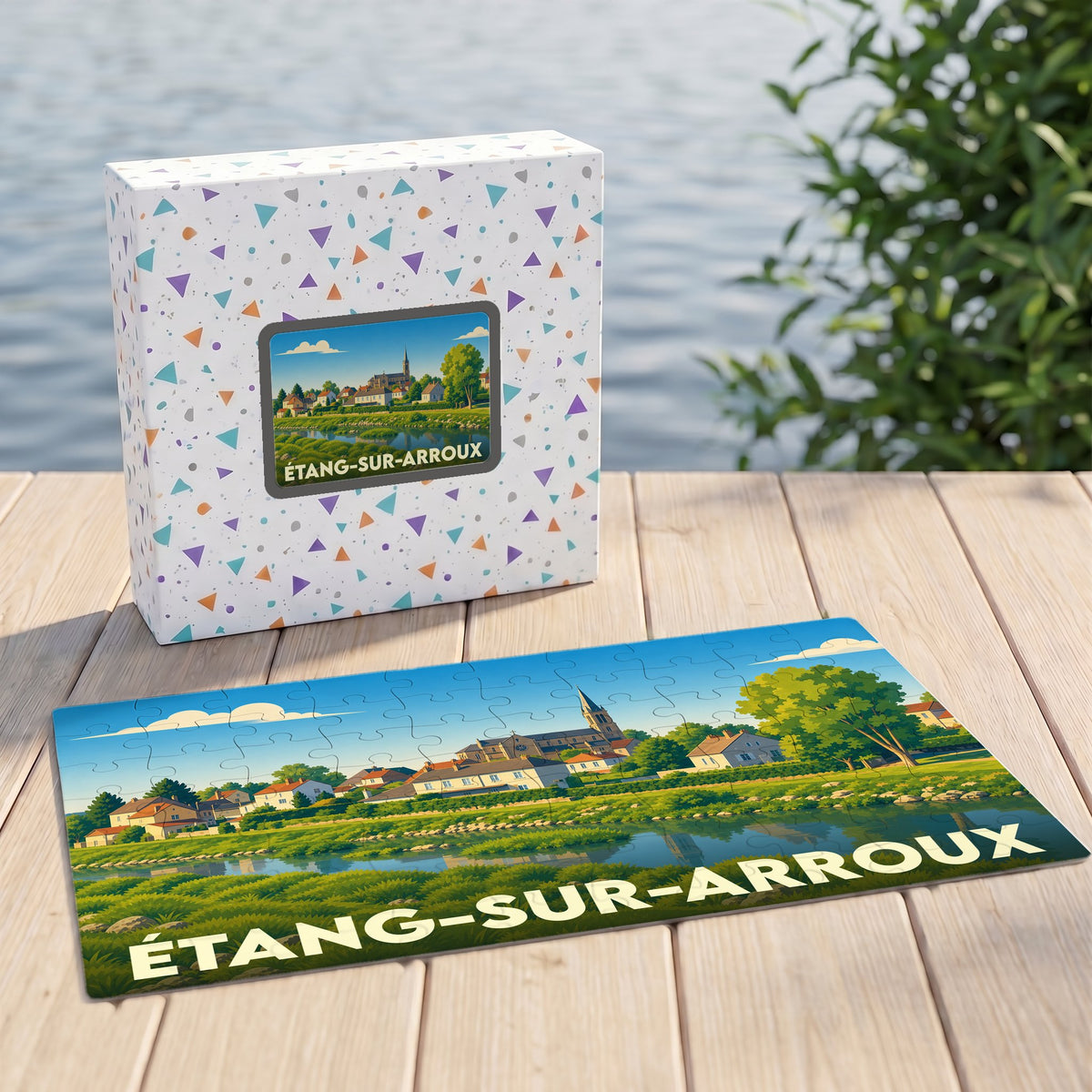 Puzzle souvenir de la ville d'Étang-sur-Arroux illustré par un paysage de bord de rivière coloré.
