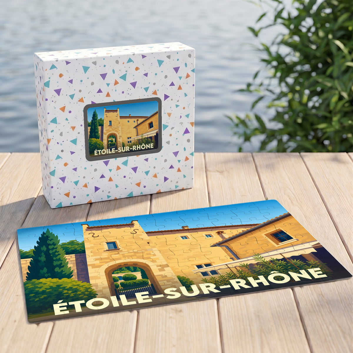 Puzzle souvenir de la ville d'Étoile-sur-Rhône avec une illustration stylisée d'un bâtiment historique.