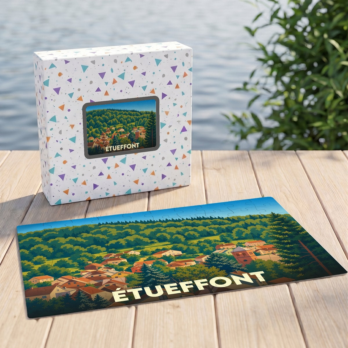 Puzzle souvenir de la ville d'Étueffont représentant une illustration stylisée du village et de sa forêt.