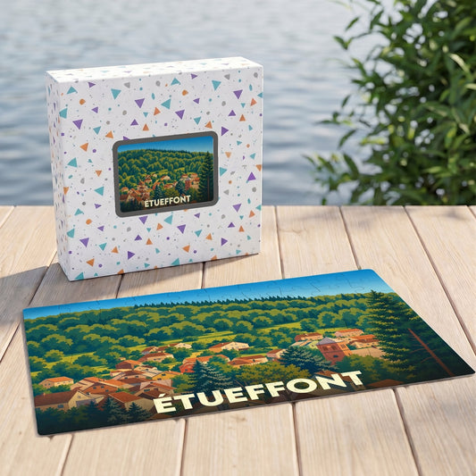 Puzzle souvenir de la ville d'Étueffont représentant une illustration stylisée du village et de sa forêt.