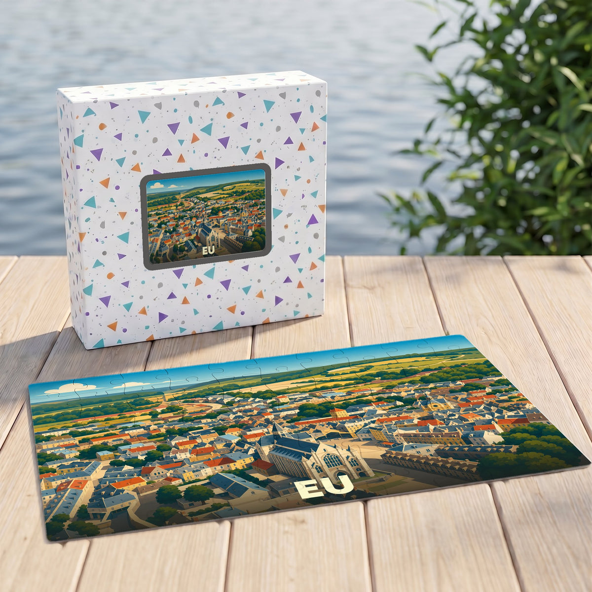 Puzzle souvenir de la ville de Eu avec une vue aérienne illustrée.