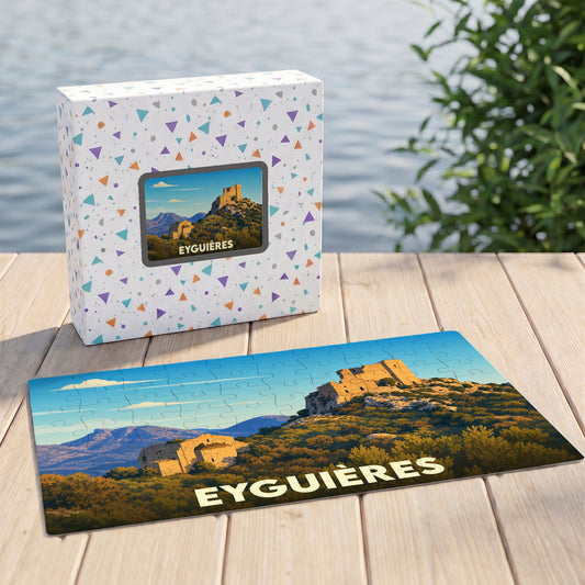 Puzzle souvenir de la ville d'Eyguières représentant un paysage provençal avec ses collines et ses vestiges historiques.