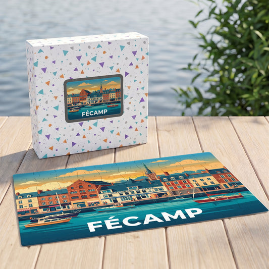 Puzzle souvenir de la ville de Fécamp avec une illustration stylisée d'un port au coucher du soleil.
