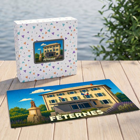 Puzzle souvenir de la ville de Féternes avec une illustration stylisée de son hôtel de ville et de son monument.