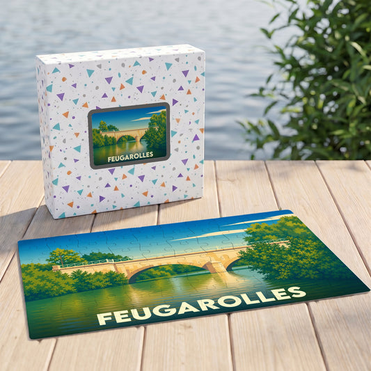 Puzzle souvenir de la ville de Feugarolles présentant une illustration stylisée d'un pont enjambant une rivière.