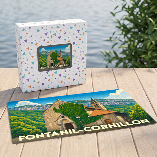 Puzzle souvenir de la ville de Fontanil-Cornillon avec une illustration stylisée d'une église sur son coffret assorti.
