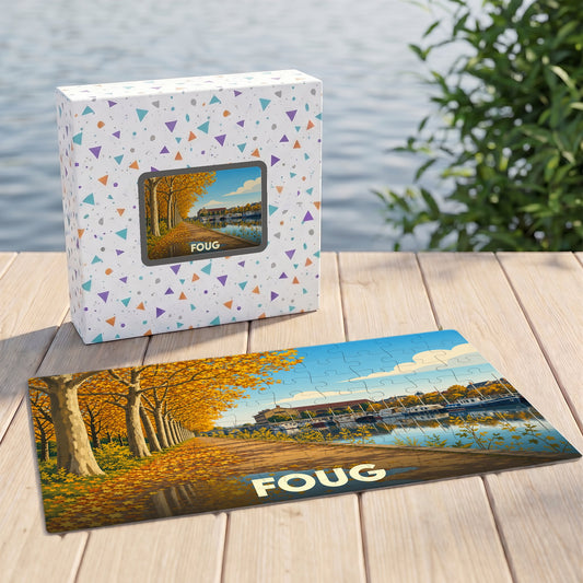 Puzzle souvenir de la ville de Foug avec une illustration automnale d'un canal bordé d'arbres.
