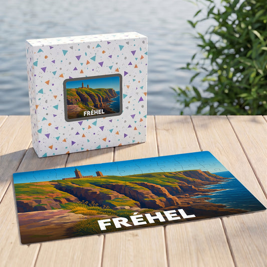 Puzzle souvenir de la ville de Fréhel illustrant ses falaises et son phare dans un style graphique épuré.