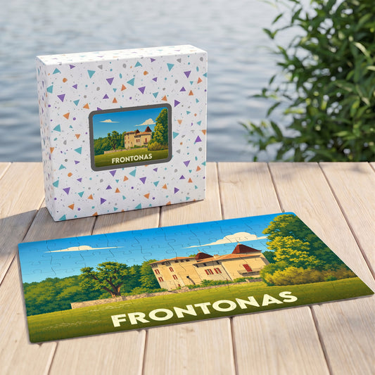 Puzzle souvenir de la ville de Frontonas avec une illustration stylisée d'un château.