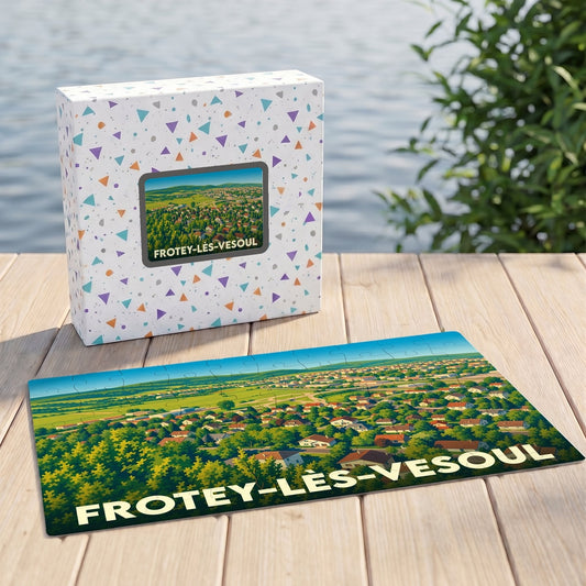 Puzzle souvenir de la ville de Frotey-lès-Vesoul avec une illustration paysagère stylisée.