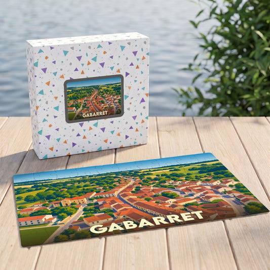 Puzzle souvenir de la ville de Gabarret avec une illustration aérienne colorée et stylisée.