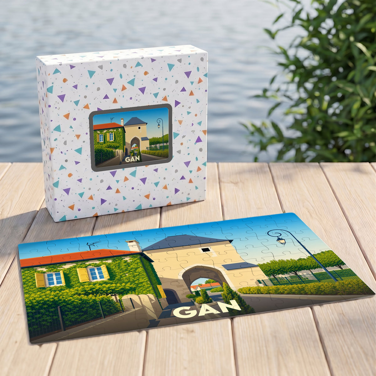Puzzle souvenir de la ville de Gan avec une illustration stylisée d'un bâtiment historique.