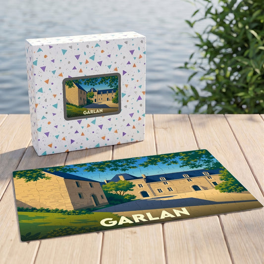 Puzzle souvenir de la ville de Garlan avec une illustration stylisée d'un manoir breton.