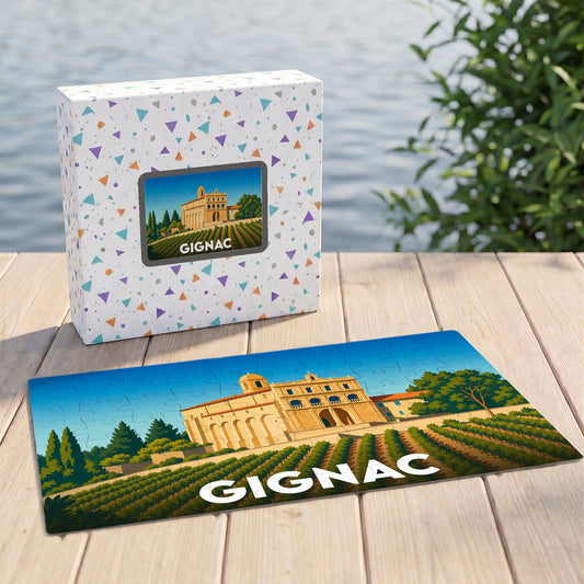 Puzzle souvenir de la ville de Gignac avec une illustration stylisée d'un bâtiment historique et de vignes.