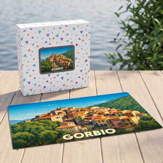 Puzzle souvenir de la ville de Gorbio avec une illustration stylisée d'un village perché.