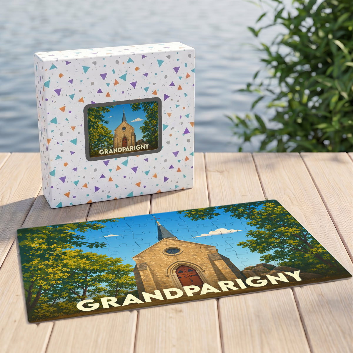 Puzzle souvenir de la ville de Grandparigny illustrant une chapelle dans un style rétro.