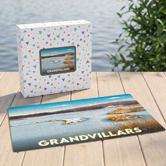 Puzzle souvenir de la ville de Grandvillars avec une illustration de paysage hivernal.
