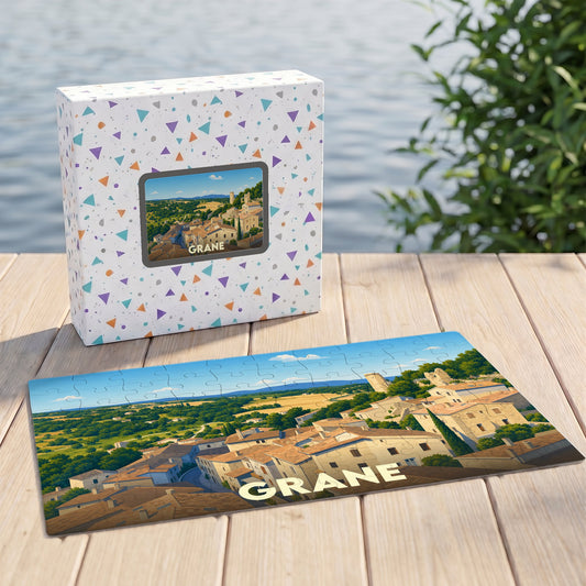 Puzzle souvenir de la ville de Grane avec une illustration panoramique de ses toits et de ses paysages.