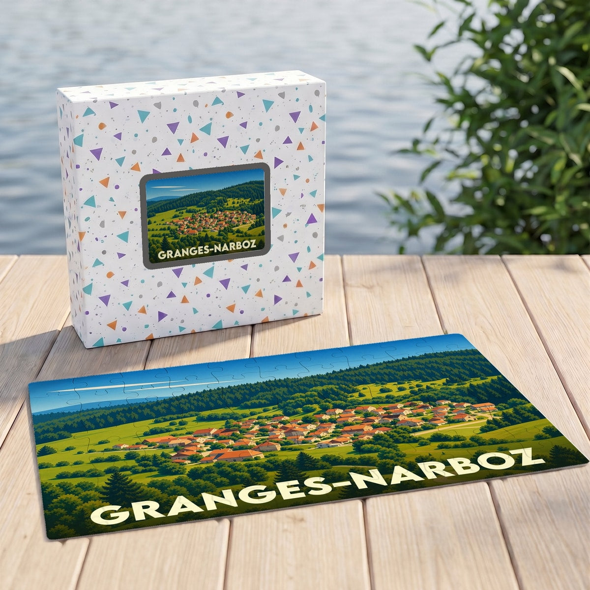 Puzzle souvenir de la ville de Granges-Narboz avec une illustration stylisée d'un village de montagne.
