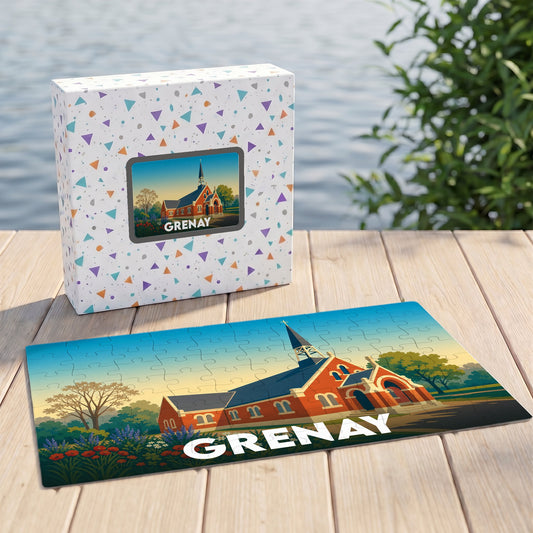 Puzzle souvenir de la ville de Grenay avec une illustration stylisée d'un bâtiment en briques rouges.