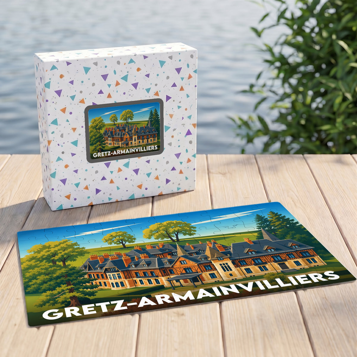 Puzzle souvenir de la ville de Gretz-Armainvilliers avec une illustration colorée d'un grand manoir.