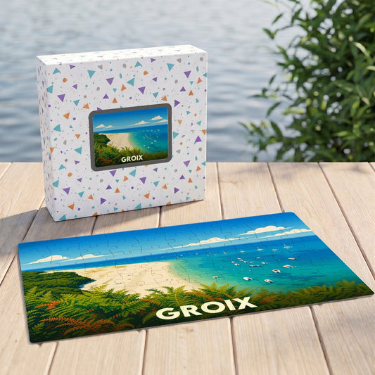 Puzzle souvenir de l'île de Groix illustrant une plage sauvage, accompagné de sa boîte décorée.
