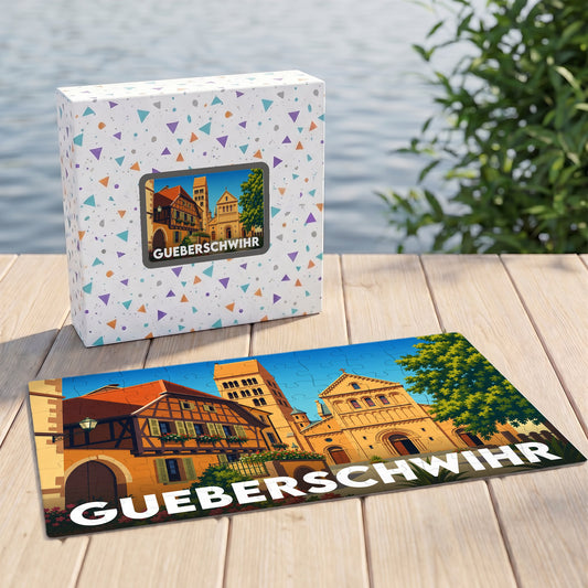 Puzzle souvenir de la ville de Gueberschwihr illustré par un paysage urbain alsacien stylisé.