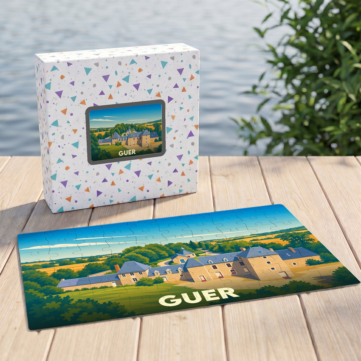 Puzzle souvenir de la ville de Guer avec une illustration stylisée d'un manoir breton.