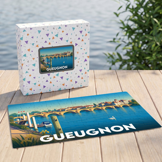 Puzzle souvenir de la ville de Gueugnon avec une illustration stylisée d'un pont et son coffret assorti.