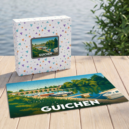 Puzzle souvenir de la ville de Guichen avec une illustration stylisée d'un paysage fluvial.