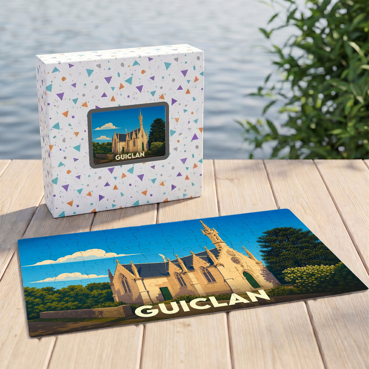 Puzzle souvenir de la ville de Guiclan avec une illustration stylisée d'un édifice historique.
