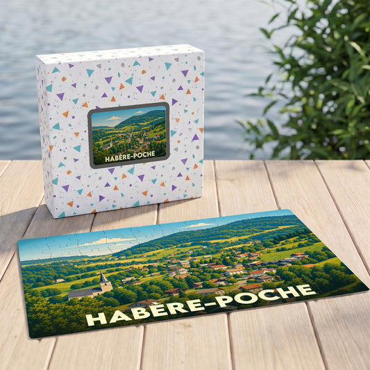 Puzzle souvenir de la ville de Habère-Poche avec une illustration paysagère stylisée.
