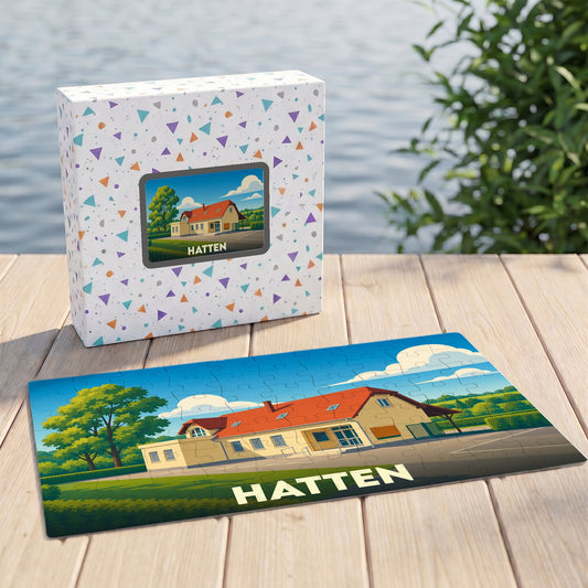 Puzzle souvenir de la ville de Hatten avec une illustration stylisée d'une maison.