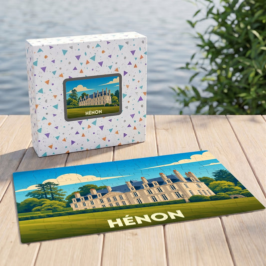 Puzzle souvenir de la ville de Hénon avec une illustration stylisée d'un château.
