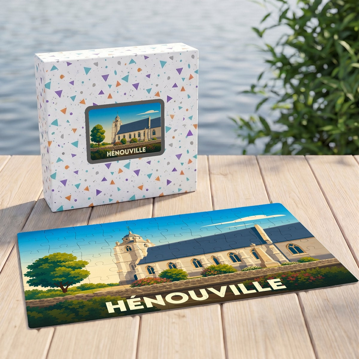 Puzzle souvenir de la ville d'Hénouville illustrant une église de style graphique.