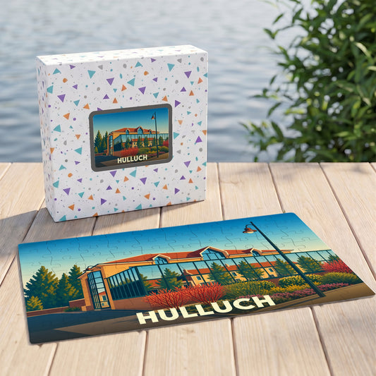 Puzzle souvenir de la ville de Hulluch avec une illustration stylisée d'un bâtiment moderne.