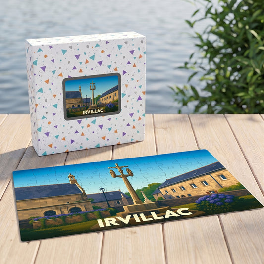 Puzzle souvenir de la ville d'Irvillac illustrant un calvaire traditionnel breton devant des bâtiments en pierre.