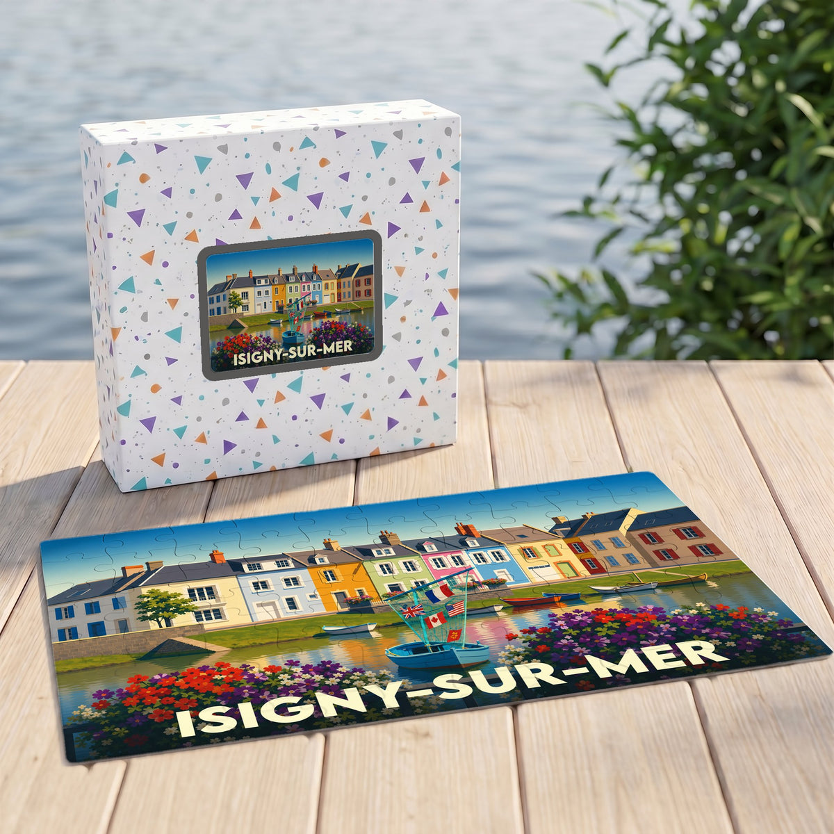 Puzzle souvenir de la ville d'Isigny-sur-Mer illustrant un port coloré avec ses maisons et bateaux typiques.