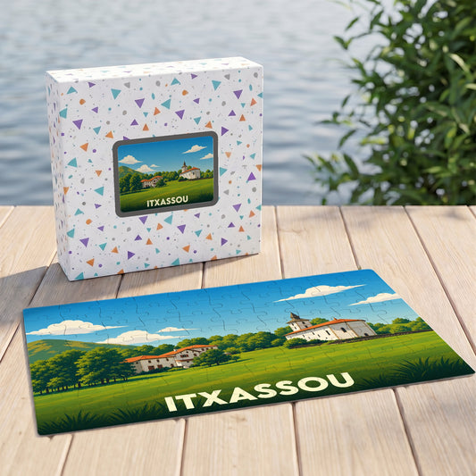 Puzzle souvenir de la ville d'Itxassou représentant un paysage champêtre avec une église et des maisons basques.